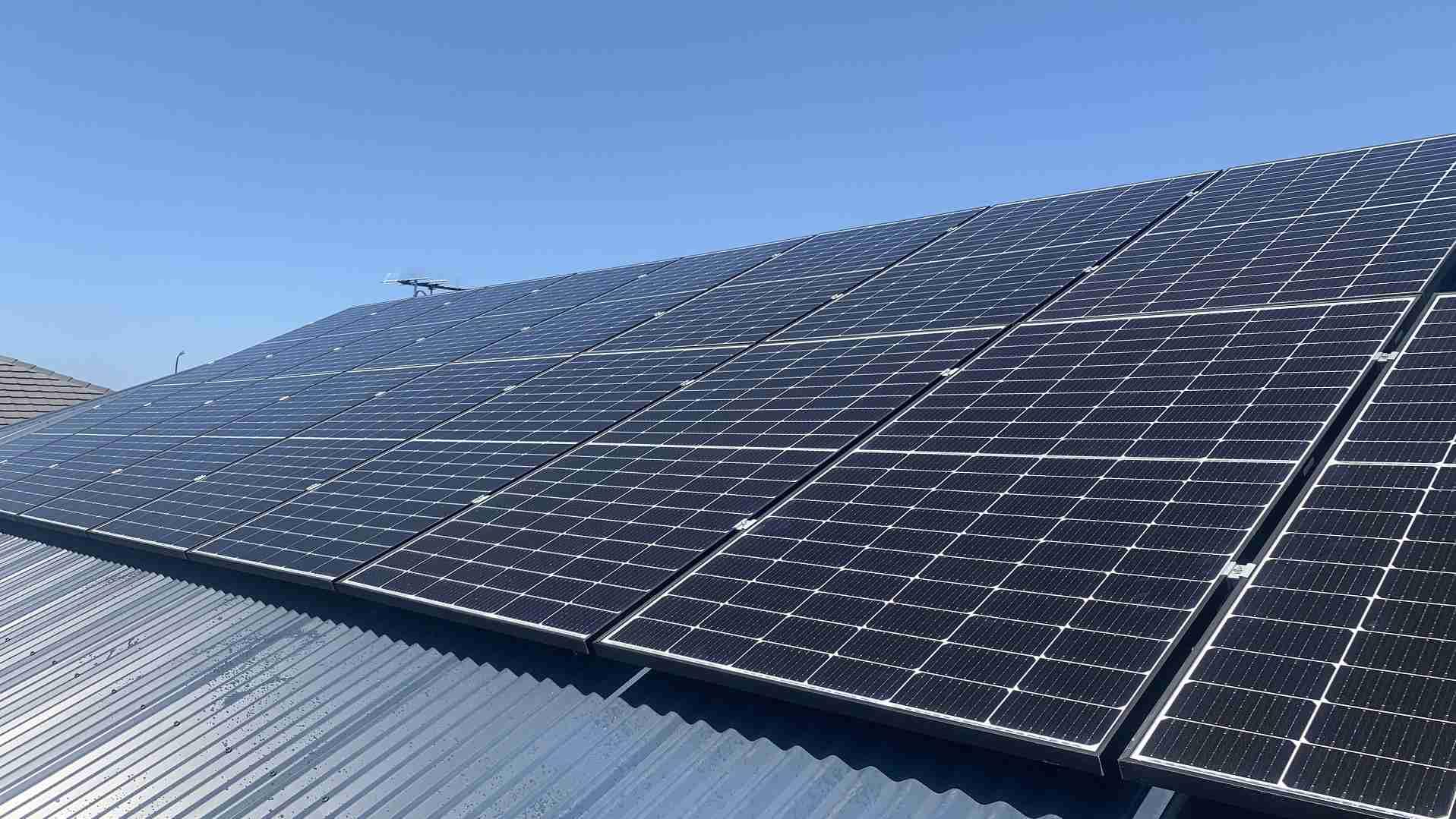 Solar panels installed on a coastal Australian home roof